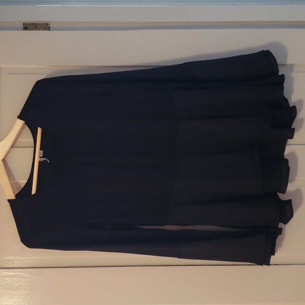 Flirty long sleeve top in a Jersey, nylon mix of fabrics!